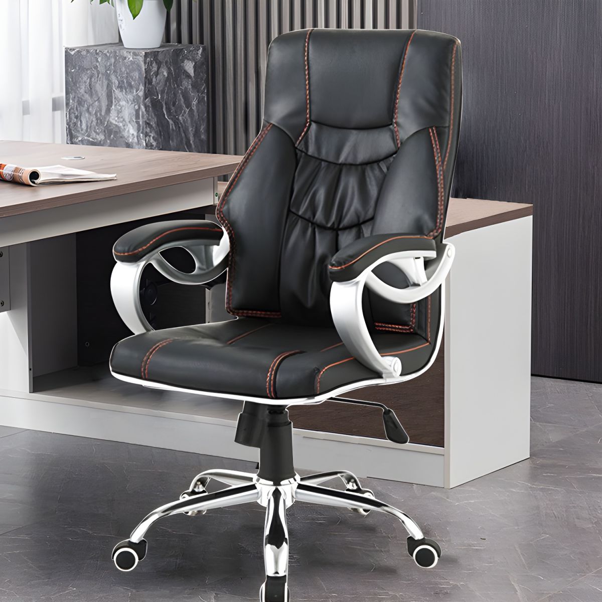 Ergonomic executive office chair with chrome finish and cushioned seat