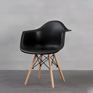Modern black studio seat with ergonomic molded seat and wooden legs, designed for offices and workspaces.